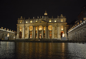 Fototapeta na wymiar Saint Peters Cathedral in Vatican City night view after rain in Rome, Italy