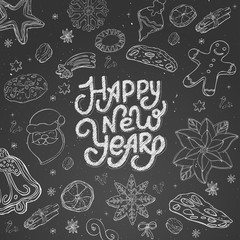 chalk white hand lettering happy new year on black background.