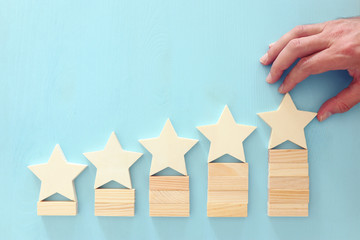 business concept image of setting a five star goal. increase rating or ranking, evaluation and...