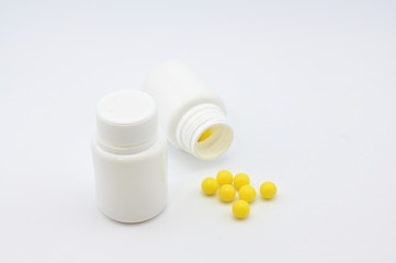 Photo of medicines with packaging, vitamins on a white background. Healthy food concept.