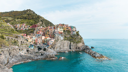 Panoramic view of old town Manarola in Riomaggiore, Italy
