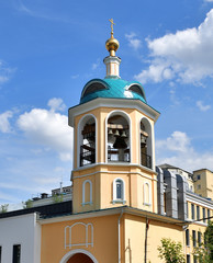 Fototapeta na wymiar bell tower of Church of the Holy Blessed Cosmas and Damian in Moscow, Russia