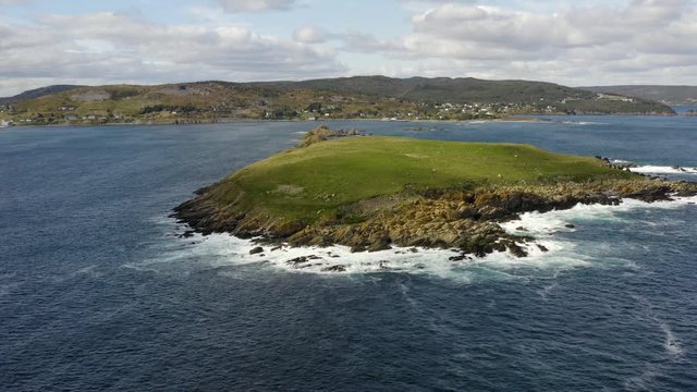 Aerial view of ocean and townhouses in newfoundland