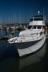 Fototapeta premium Boats in the harbour at Fisherman's Wharf, San Francisco