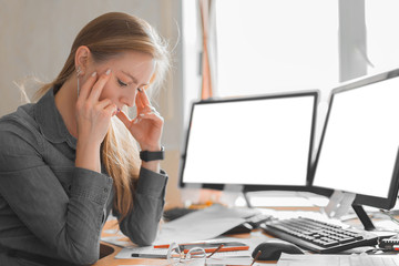 Exhausted woman working in an office before the deadline. Close up photo