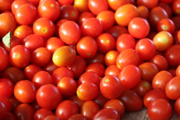 Delicious red tomatoes. Summer tray market agriculture farm full of organic vegetables It can be used as background.