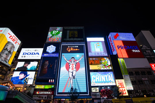 OSAKA - JAN 09: The Glico Man advertising billboard at  Dotonbori entertainment district in Osaka on January 09. 2017 in Japan. Dotonbori is one of the principal tourist destinations in Osaka.