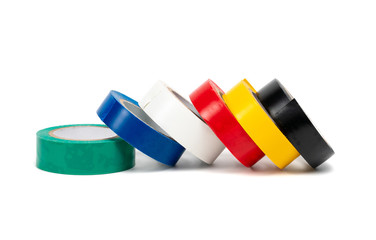 Rolls of insulation adhesive tape, multi colored ribbons on a white background.
