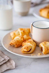 Homemade cookies with jam on a light background. Natural light.