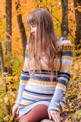 Girl on a walk in the autumn Park . Autumn park. Walk. Young girl.