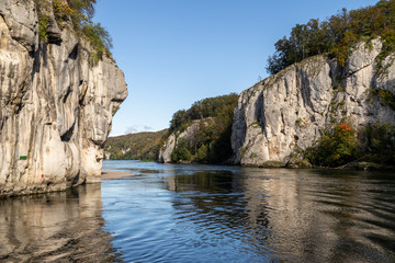 Danube river breakthrough near Kelheim, Bavaria, Germany in autumn with limestone rock formations...