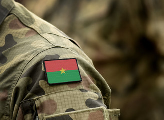 Flag of Burkina Faso on military uniform. Army, troops, soldiers, Africa, (collage).