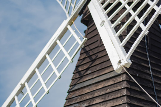 Detailed view of the wooden, lattice sales seen on a timber built, historic windmill used as a river pumping station in East Anglia.