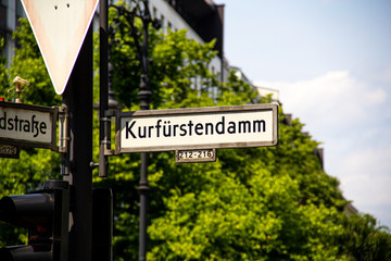 A street sign showing the name of the famous avenue called Kurfürstendamm (also known as Ku'damm)...