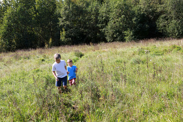 Children walking on field
