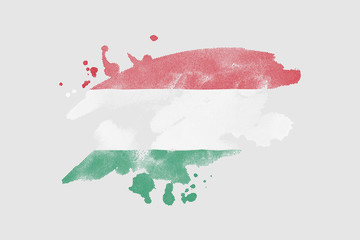 National flag of Hungary. Stylized Hungarian flag with watercolor halftone effect on plain background