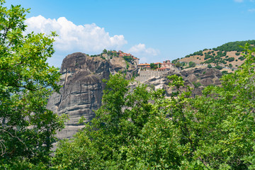 Fototapeta premium Monasteries atop huge rock pinnacles