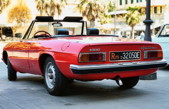 beutiful red car model Alfa Romeo 1300  also called Duetto manufactured by Italian Alfa Romeo since 1966, Rome,Italy - July 20, 2019