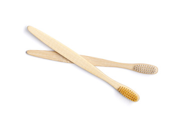 Two Bamboo toothbrushes on white background. Dental care