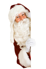 Christmas: Smiling Santa Looks Out From Behind White Card