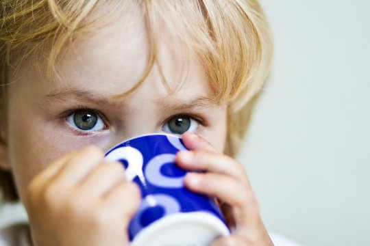 Germany, Kiel, Portrait of girl drinking