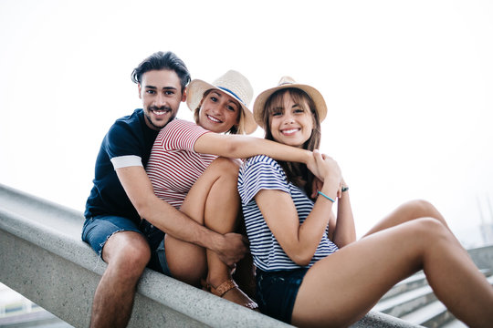 Group picture of three happy friends