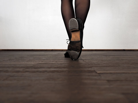 Legs of step dancing woman