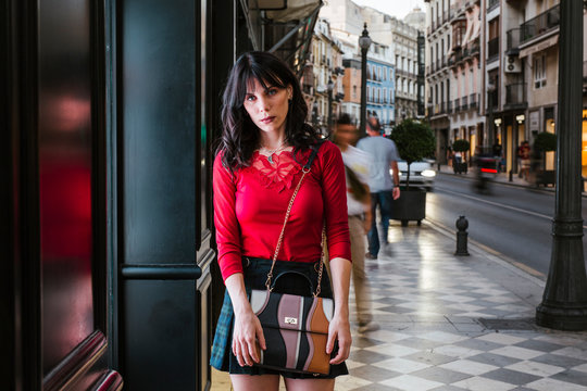 Portrait of a young woman in the city