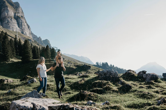 Family with little son on a hiking trip in the mountains, Schwaegalp, Nesslau, Switzerland