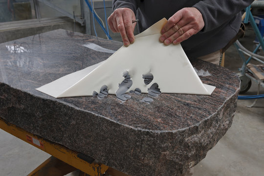 Germany, Stone mason manufacturing grave stone