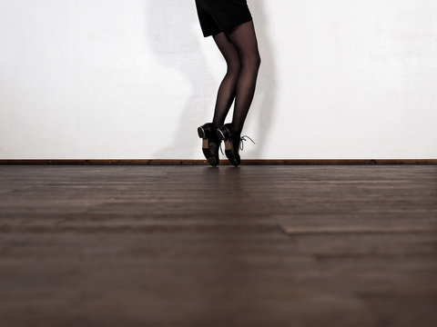 Legs of step dancing woman