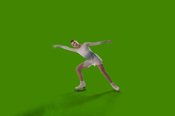 Figure skating girl isolated on green background.