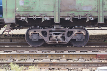 Naklejka premium A pair of wheels of a freight train close up