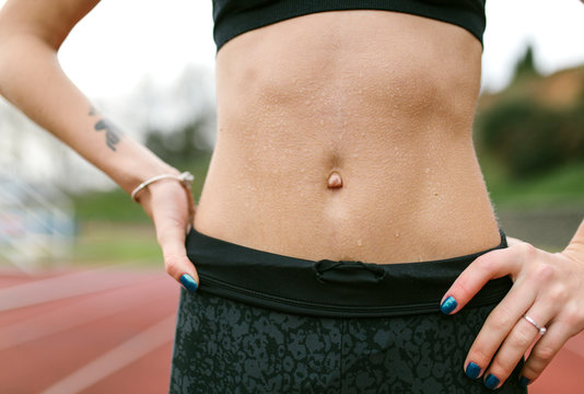 Athlete woman, abdominal muscles
