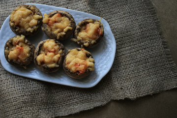 Baked mushrooms on a white plate