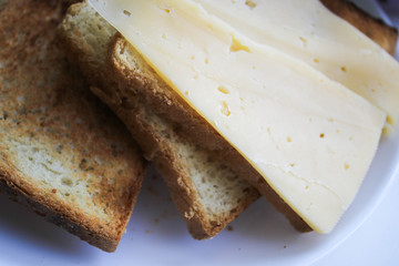 Sandwiches with cheese on a plate for breakfast