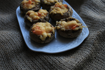 Baked mushrooms on a white plate