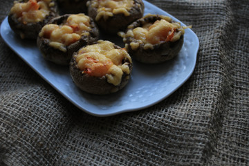 Baked mushrooms on a white plate