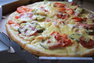 Photo of pizza with vegetables close up