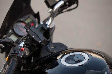 Stylish black sports bike on the street.