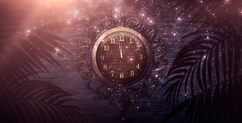 Dark room, spotlight, rays. Old clock in a metal frame. Old brick wall, neon light. Empty room scene, night view. © MiaStendal