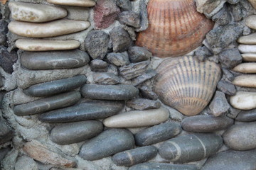  photo wall decorations.stones on the wall on the cement.for decoration seashells.all in shades of gray. beautiful Wallpaper.