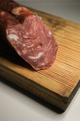 Sausage on a wooden board