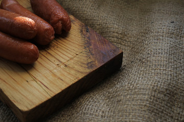 Sausages on a wooden board