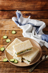 Cucumber cream cheese sandwiches on the plate