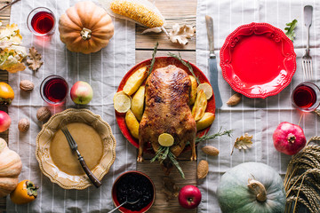 Thanksgiving dinner table with turkey, top view