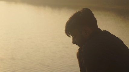 silhouette of boy in sunset