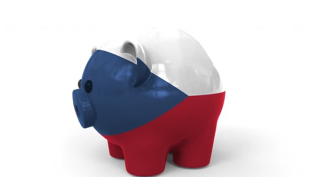 Coins fall into piggy bank painted with flag of the Czech Republic. National banking system or savings related conceptual 3D animation