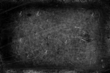 Dirty stone surface covered with scratches, monochrome tonality.