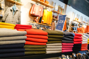 Dress store interior clothing shop sweater pullover colorful